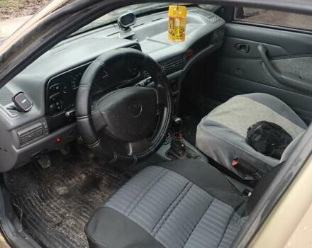 Бежевий Деу Нексія, об'ємом двигуна 1.5 л та пробігом 277 тис. км за 999 $, фото 7 на Automoto.ua