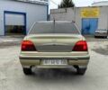 Бежевий Деу Нексія, об'ємом двигуна 1.6 л та пробігом 300 тис. км за 1550 $, фото 5 на Automoto.ua