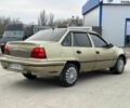 Бежевий Деу Нексія, об'ємом двигуна 1.6 л та пробігом 300 тис. км за 1550 $, фото 1 на Automoto.ua