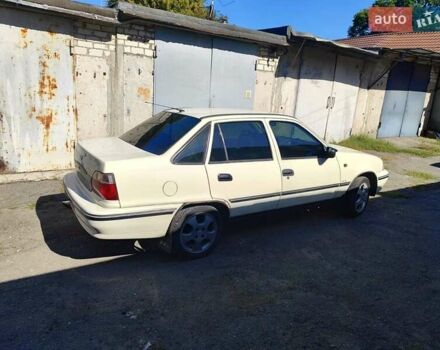 Бежевий Деу Нексія, об'ємом двигуна 1.6 л та пробігом 205 тис. км за 1600 $, фото 9 на Automoto.ua