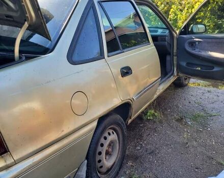 Бежевий Деу Нексія, об'ємом двигуна 1.5 л та пробігом 175 тис. км за 1050 $, фото 9 на Automoto.ua