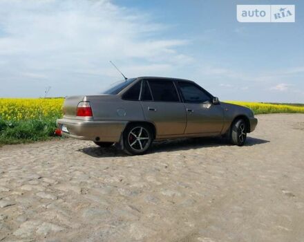 Бежевий Деу Нексія, об'ємом двигуна 1.5 л та пробігом 350 тис. км за 2100 $, фото 2 на Automoto.ua