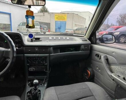 Бежевий Деу Нексія, об'ємом двигуна 1.6 л та пробігом 300 тис. км за 1550 $, фото 10 на Automoto.ua