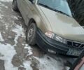 Бежевый Дэу Нексия, объемом двигателя 1.5 л и пробегом 245 тыс. км за 1900 $, фото 1 на Automoto.ua