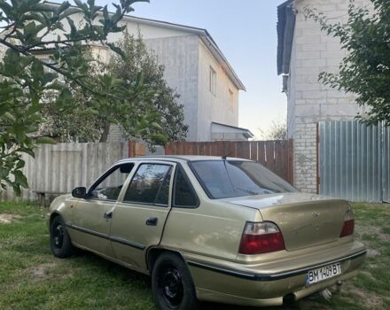 Бежевий Деу Нексія, об'ємом двигуна 1.5 л та пробігом 150 тис. км за 698 $, фото 7 на Automoto.ua