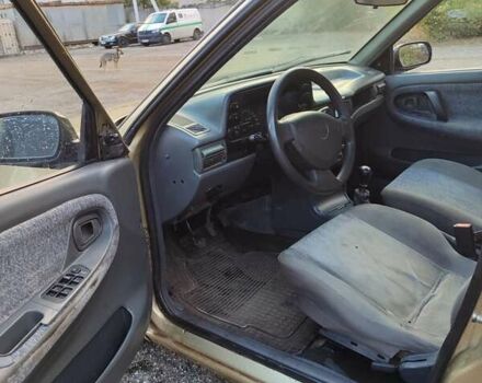Бежевий Деу Нексія, об'ємом двигуна 1.5 л та пробігом 200 тис. км за 1450 $, фото 7 на Automoto.ua