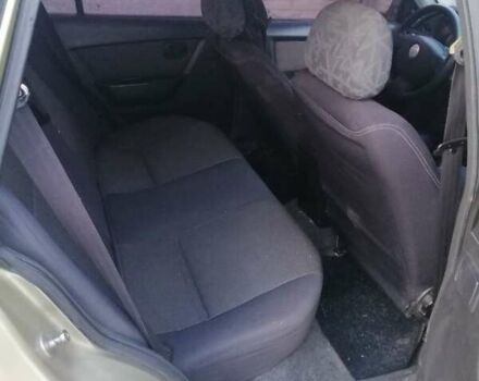 Бежевий Деу Нексія, об'ємом двигуна 1.5 л та пробігом 345 тис. км за 1000 $, фото 6 на Automoto.ua