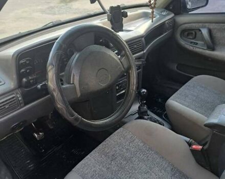 Бежевий Деу Нексія, об'ємом двигуна 1.5 л та пробігом 100 тис. км за 1800 $, фото 6 на Automoto.ua