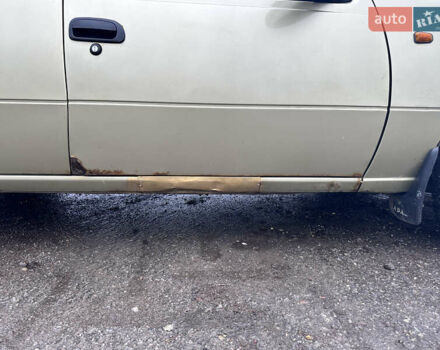 Бежевый Дэу Нексия, объемом двигателя 1.5 л и пробегом 254 тыс. км за 1950 $, фото 8 на Automoto.ua
