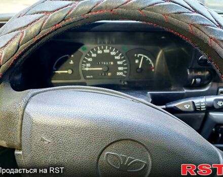 Бежевий Деу Нексія, об'ємом двигуна 1.5 л та пробігом 117 тис. км за 1655 $, фото 8 на Automoto.ua