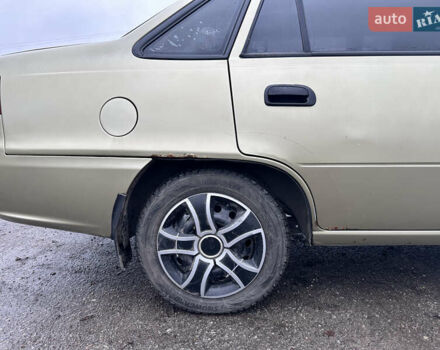 Бежевый Дэу Нексия, объемом двигателя 1.5 л и пробегом 254 тыс. км за 1950 $, фото 7 на Automoto.ua