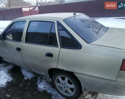 Бежевий Деу Нексія, об'ємом двигуна 1.5 л та пробігом 345 тис. км за 1000 $, фото 2 на Automoto.ua