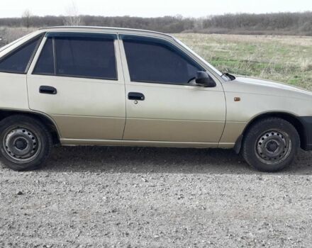 Бежевий Деу Нексія, об'ємом двигуна 1.5 л та пробігом 200 тис. км за 2000 $, фото 3 на Automoto.ua