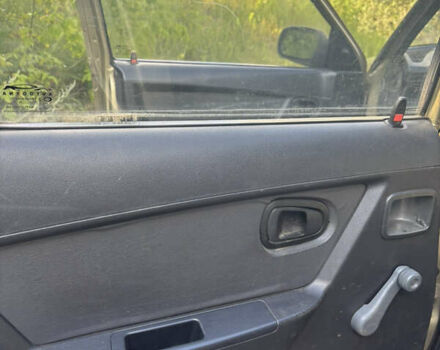 Бежевий Деу Нексія, об'ємом двигуна 1.5 л та пробігом 193 тис. км за 2100 $, фото 12 на Automoto.ua