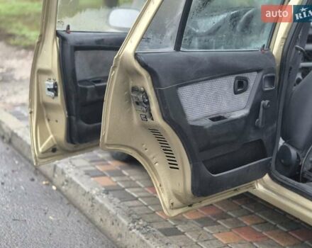 Бежевий Деу Нексія, об'ємом двигуна 1.5 л та пробігом 133 тис. км за 1999 $, фото 7 на Automoto.ua