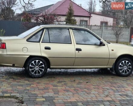 Бежевий Деу Нексія, об'ємом двигуна 1.5 л та пробігом 133 тис. км за 1999 $, фото 4 на Automoto.ua