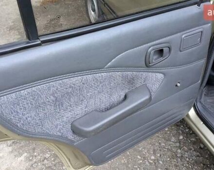 Бежевый Дэу Нексия, объемом двигателя 1.5 л и пробегом 155 тыс. км за 2255 $, фото 1 на Automoto.ua