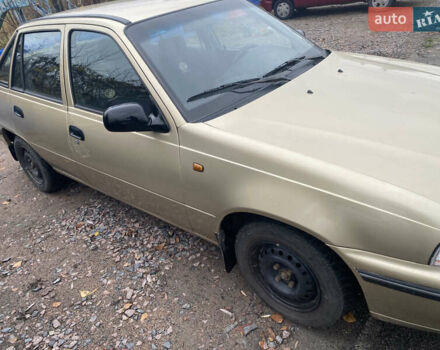 Бежевий Деу Нексія, об'ємом двигуна 1.5 л та пробігом 308 тис. км за 2100 $, фото 1 на Automoto.ua