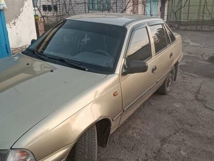 Бежевий Деу Нексія, об'ємом двигуна 1.6 л та пробігом 280 тис. км за 1667 $, фото 1 на Automoto.ua