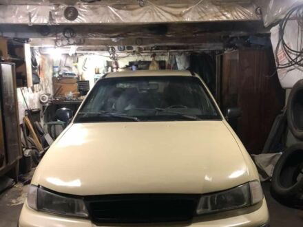 Бежевый Дэу Нексия, объемом двигателя 1 л и пробегом 200 тыс. км за 1200 $, фото 1 на Automoto.ua