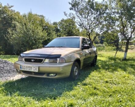 Бежевий Деу Нексія, об'ємом двигуна 1.5 л та пробігом 300 тис. км за 1350 $, фото 1 на Automoto.ua