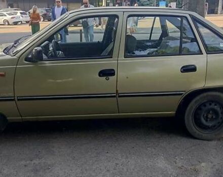 Бежевий Деу Нексія, об'ємом двигуна 1.5 л та пробігом 217 тис. км за 2000 $, фото 1 на Automoto.ua