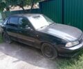 Черный Дэу Нексия, объемом двигателя 1.5 л и пробегом 300 тыс. км за 500 $, фото 1 на Automoto.ua