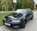 Черный Дэу Нексия, объемом двигателя 1.6 л и пробегом 330 тыс. км за 1250 $, фото 5 на Automoto.ua
