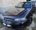 Черный Дэу Нексия, объемом двигателя 1.5 л и пробегом 190 тыс. км за 1599 $, фото 1 на Automoto.ua