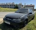 Черный Дэу Нексия, объемом двигателя 1.5 л и пробегом 240 тыс. км за 950 $, фото 1 на Automoto.ua