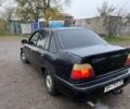 Чорний Деу Нексія, об'ємом двигуна 1.5 л та пробігом 150 тис. км за 1000 $, фото 1 на Automoto.ua