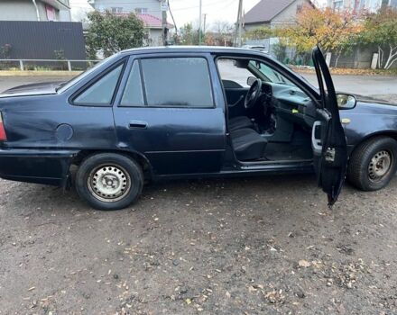 Чорний Деу Нексія, об'ємом двигуна 1.5 л та пробігом 150 тис. км за 1000 $, фото 8 на Automoto.ua