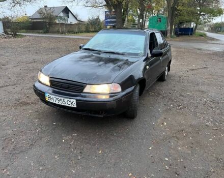 Чорний Деу Нексія, об'ємом двигуна 1.5 л та пробігом 150 тис. км за 1000 $, фото 2 на Automoto.ua