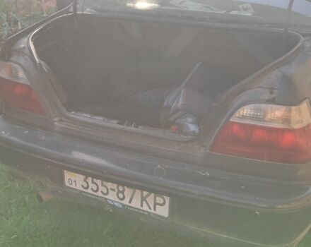 Чорний Деу Нексія, об'ємом двигуна 1.6 л та пробігом 304 тис. км за 713 $, фото 5 на Automoto.ua