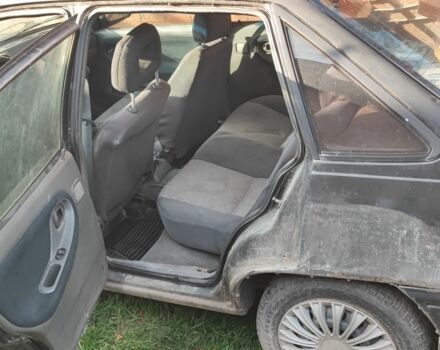 Чорний Деу Нексія, об'ємом двигуна 1.6 л та пробігом 304 тис. км за 713 $, фото 6 на Automoto.ua