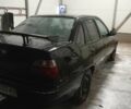 Деу Нексія 1997 у Умани на Automoto.ua Чорний Деу Нексія, об'ємом двигуна 1.5 л та пробігом 300 тис. км за 1000 $, фото 1 на Automoto.ua
