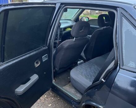 Чорний Деу Нексія, об'ємом двигуна 1.5 л та пробігом 150 тис. км за 1000 $, фото 3 на Automoto.ua