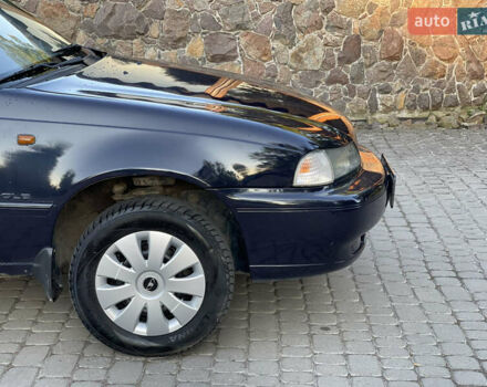 Черный Дэу Нексия, объемом двигателя 1.5 л и пробегом 168 тыс. км за 1599 $, фото 3 на Automoto.ua