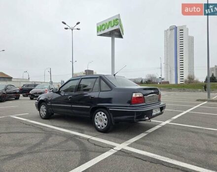 Черный Дэу Нексия, объемом двигателя 1.5 л и пробегом 141 тыс. км за 2800 $, фото 2 на Automoto.ua