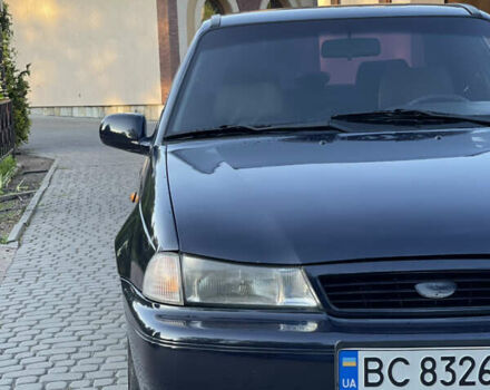 Черный Дэу Нексия, объемом двигателя 1.5 л и пробегом 168 тыс. км за 1599 $, фото 6 на Automoto.ua