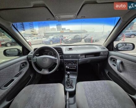 Черный Дэу Нексия, объемом двигателя 1.5 л и пробегом 141 тыс. км за 2800 $, фото 11 на Automoto.ua