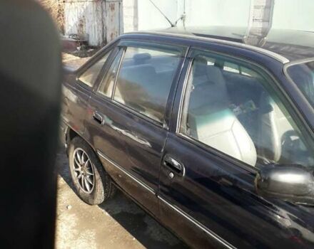 Чорний Деу Нексія, об'ємом двигуна 1.6 л та пробігом 217 тис. км за 1500 $, фото 6 на Automoto.ua