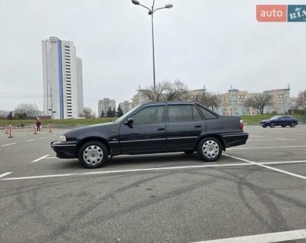 Черный Дэу Нексия, объемом двигателя 1.5 л и пробегом 141 тыс. км за 2800 $, фото 1 на Automoto.ua