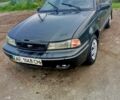 Черный Дэу Нексия, объемом двигателя 1.5 л и пробегом 200 тыс. км за 950 $, фото 1 на Automoto.ua