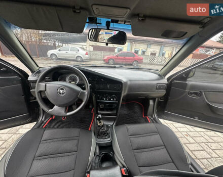 Чорний Деу Нексія, об'ємом двигуна 1.5 л та пробігом 260 тис. км за 2000 $, фото 10 на Automoto.ua