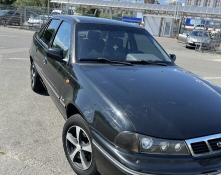 Чорний Деу Нексія, об'ємом двигуна 1.5 л та пробігом 140 тис. км за 2650 $, фото 11 на Automoto.ua