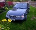 Чорний Деу Нексія, об'ємом двигуна 1.5 л та пробігом 193 тис. км за 1250 $, фото 1 на Automoto.ua