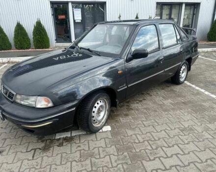 Черный Дэу Нексия, объемом двигателя 1.5 л и пробегом 213 тыс. км за 850 $, фото 5 на Automoto.ua