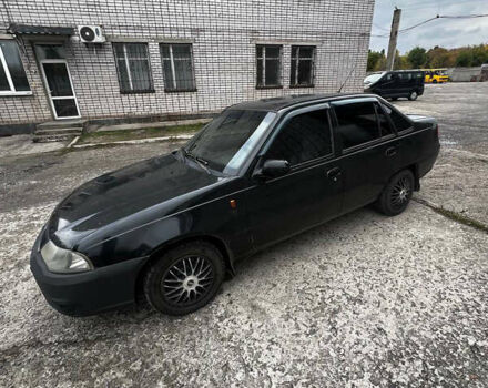 Черный Дэу Нексия, объемом двигателя 1.5 л и пробегом 250 тыс. км за 1450 $, фото 1 на Automoto.ua
