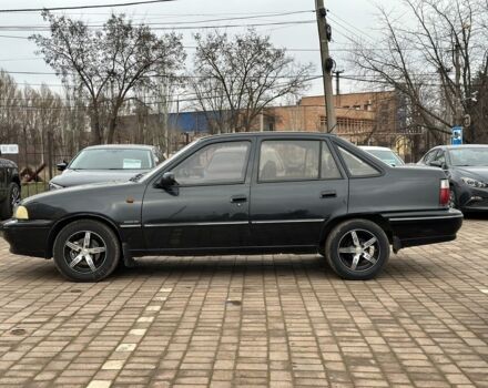 Черный Дэу Нексия, объемом двигателя 1.5 л и пробегом 210 тыс. км за 2450 $, фото 7 на Automoto.ua